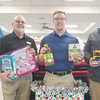 Deien Chevrolet kicked off the Stuff the Truck food and toy drive with employee donations.
Above, left to right, are Nathan Deien, Ed Tuggle, Bradley Cooper and Mike Jones.